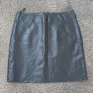 Size 4. Black leather mini skirt from Bebe.